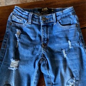 Girls L&B ripped jeans with camo cuffs